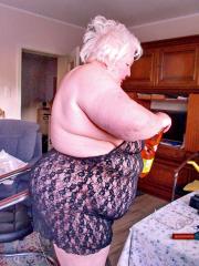 Chubby granny Marie Theres shows her big saggy tits & ass while changing