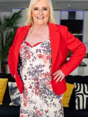 Naughty blonde granny Claire Knight shows her big ass wearing red panties