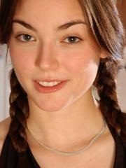Brunette teen Josie unveils her firm tits before spreading her beaver