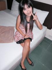 Busty Thai girl Beer gives up her shaved pussy to a sex tourist in hotel room