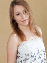 Adorable teen Nikia A flaunts her titties and bald pussy on the floor
