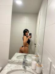 Brunette amateur with nice big tits takes naked selfies in lingerie
