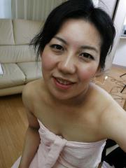 Lusty asian mature lady has some pussy fingering fun after bath