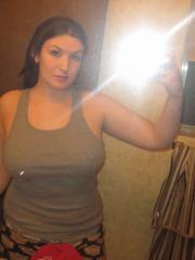 Amateur solo girl takes mirror selfies of her large breasts