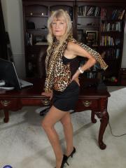 Hot granny Candis toying her cock-hungry wet pussy in solo office masturbation