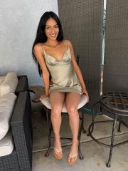Brunette amateur Laynee James displays her bare feet prior to showing her pussy