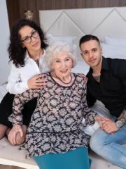 Kinky granny takes part in a threesome with a younger couple