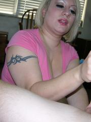 Chubby blonde amateur jerks on a dick while getting totally naked