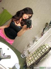 Alluring brunette teen takes selfies of natural big tits before POV titty fuck