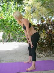Exercising girl in yoga pants bending over to show hot ass outdoors