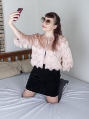 Small-titted babe Calliope probing her hairy pussy with a finger up close