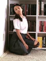 Hot Asian schoolgirl shows off her big tits & hairy muff in the library