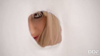 Sandra Star devours a cock through the wall