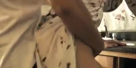 Great looking mom with big tits and a younger guy who is waiting for her son are having sex