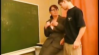 Horny teacher is using an opportunity to fuck one of her students, while no one is watching