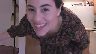 An amateur mom turned on her web camera and started rubbing her pussy in the kitchen
