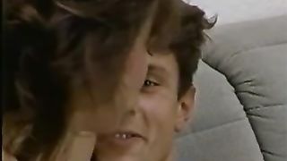 Horny German mom and her son's friend are about to have sex on the couch