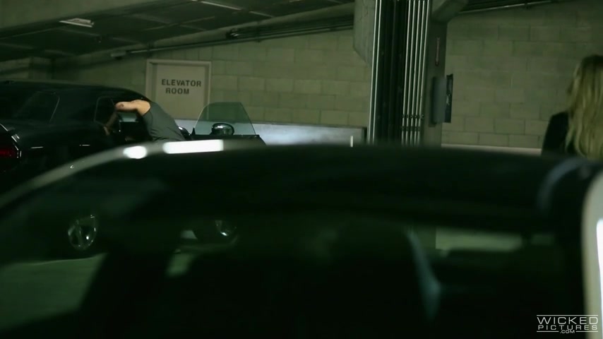 Blonde woman got down and dirty with a handsome stranger in a parking lot, late at night