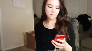 Sweet teen brunette is showing her tits on web cam and earning money every single day