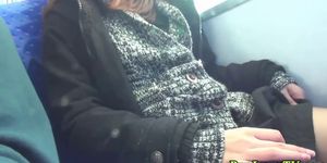 Asian peeing on train