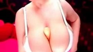 Teen with super huge tits teases during live cam show