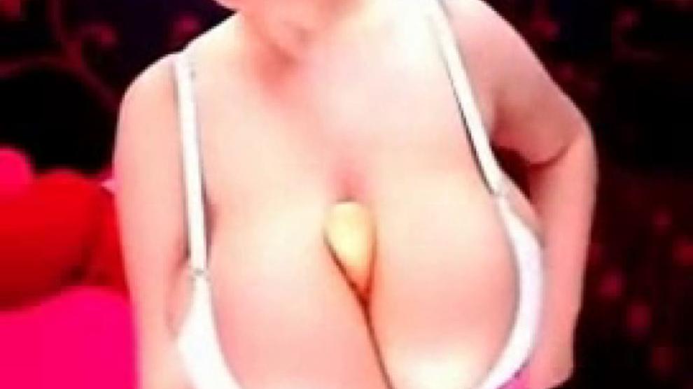 Teen with super huge tits teases during live cam show