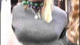 two girls showing off at Mardi Gras