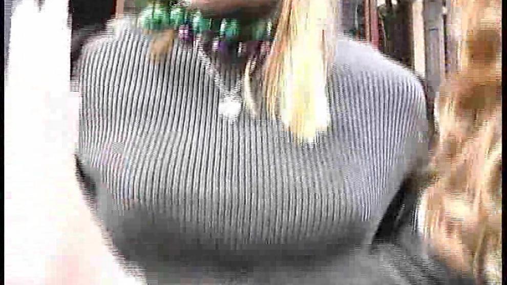 two girls showing off at Mardi Gras