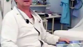 Rubing her clit in the gyno exam