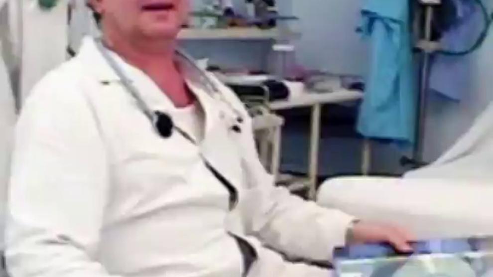 Rubing her clit in the gyno exam