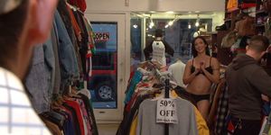 Brunette sucks cock in records shop