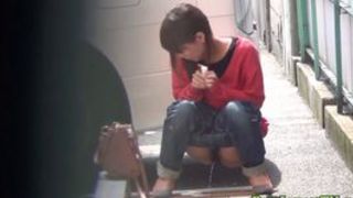 Bizarre Asian whore pees in car park