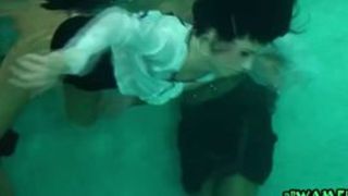Lesbian friends get touchy inside public pool