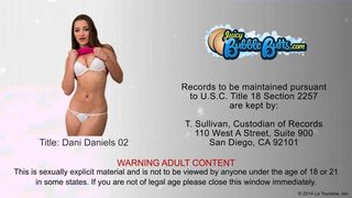 Dani Daniels shows off her round ass while fucking