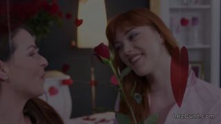 Redhead young lesbo licks brunette Milf