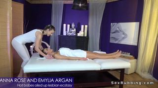Bare tits masseuse rubbing brunette babe