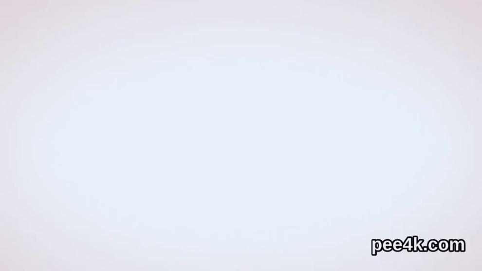 Ravishing teen is pissing and rubbing smooth vagina