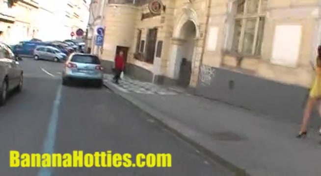 She shows her naked body at the public street