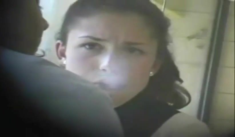 Brunette with wonderful Snap Inhales smoking a Cigarette in a Caf&Atild