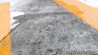 Weird asian pisses street