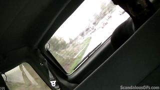SCANDALOUSGFS - Hot Babe rubbing a cock while the guy driving caught on tape