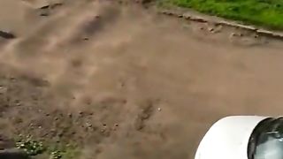 Drunk older woman walks topless