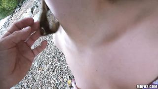 Two babes suck two cocks outdoors