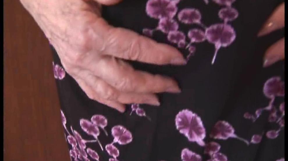 Attractive busty granny and teases then shows off her hairy plump pussy