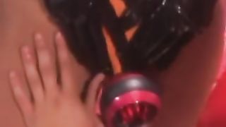 Masked latex subs toyed with by lesbian dominatrix
