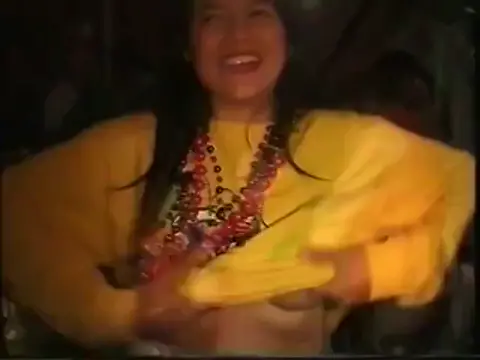 Mardi Gras girl accepts a stranger's offer to suck her tits